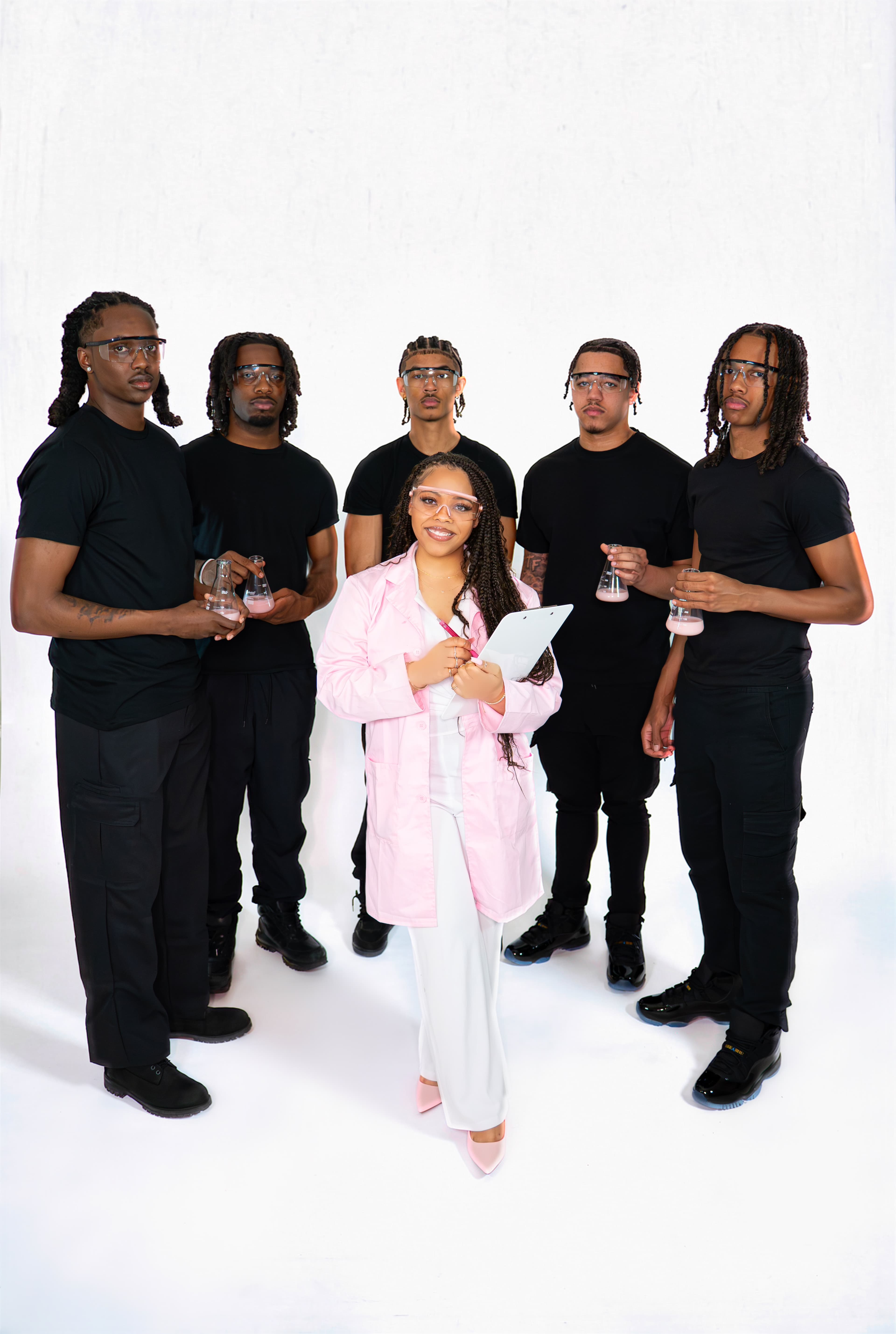 Shawnie and her clients — the Loc Lab crew